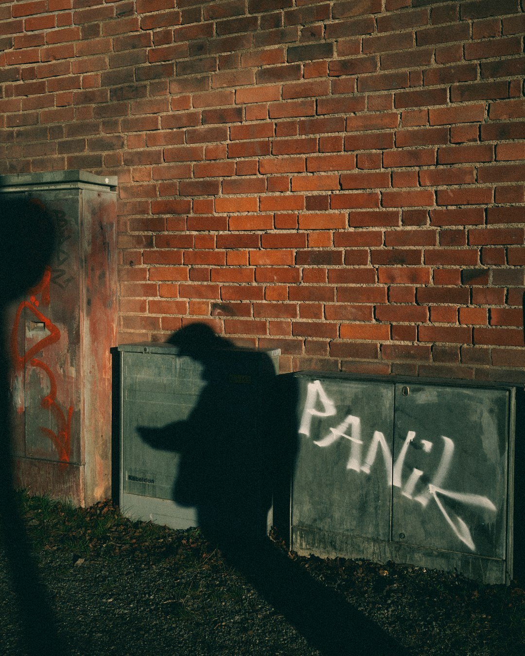 shadowy figure in alley